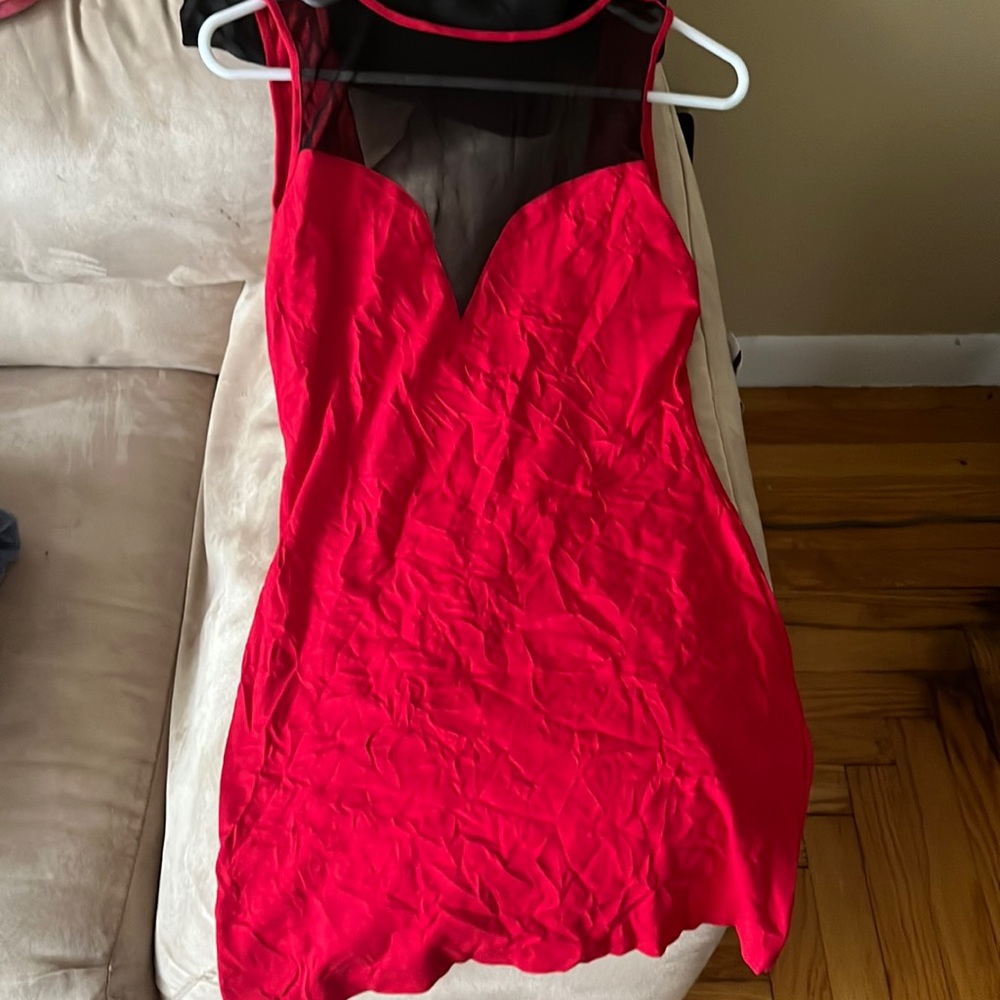Red open back mini dress. Size medium. Never worn